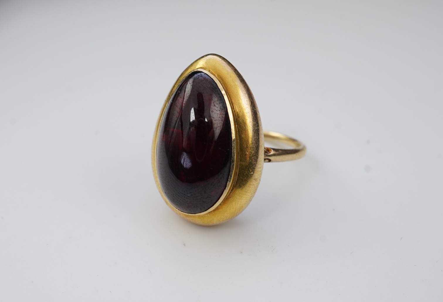 An unusual garnet locket ring, late 19th century composite